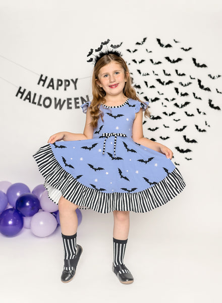 Batty Purple Knit Bat Print Swing Dress with Black and White Stripe Ruffle