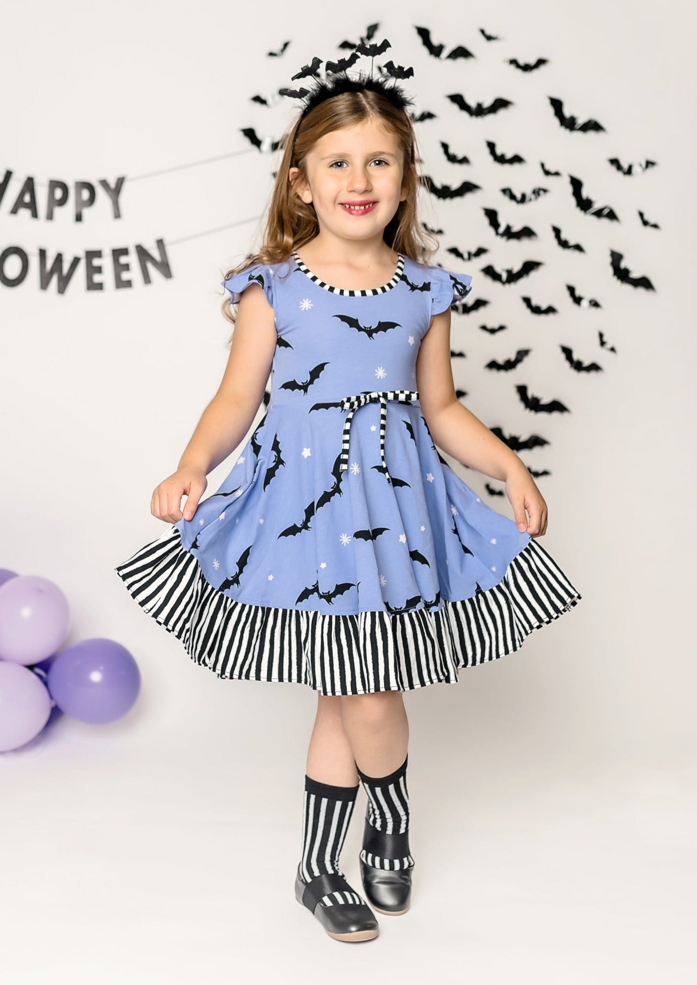 Batty Purple Knit Bat Print Swing Dress with Black and White Stripe Ruffle