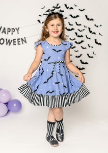 Batty Purple Knit Bat Print Swing Dress with Black and White Stripe Ruffle