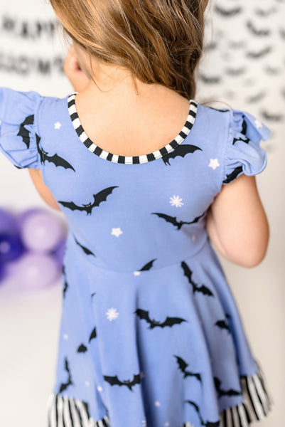 Batty Purple Knit Bat Print Swing Dress with Black and White Stripe Ruffle