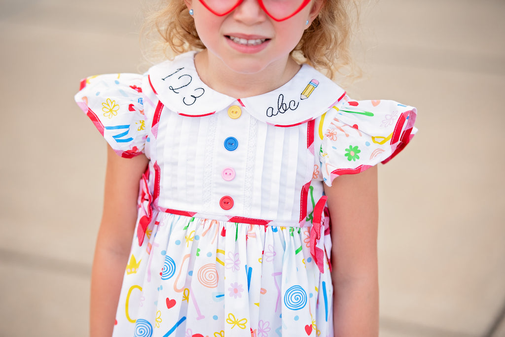 ABCs & 123s Alphabet Print Embroidered Collar Dress poshpickle.com ABCs & 123s Alphabet Print Embroidered Collar Dress poshpickle.com