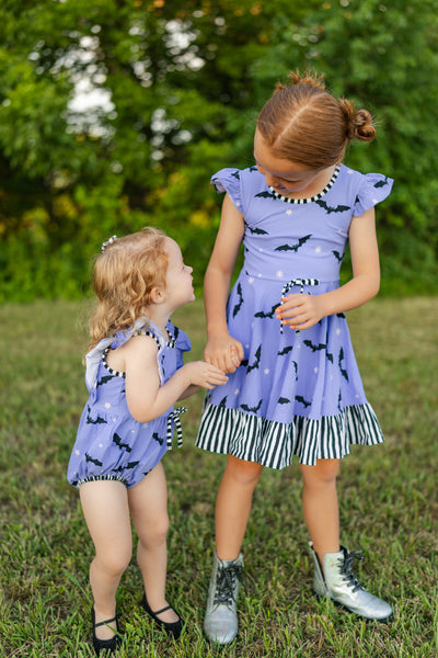 Batty Purple Knit Bat Print Swing Dress with Black and White Stripe Ruffle