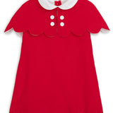 Red dress with white collar and buttons on a white background