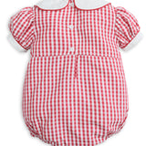 A baby romper in a red and white gingham check pattern, featuring a white collar, short puff sleeves with white cuffs, and three white buttons on the front.