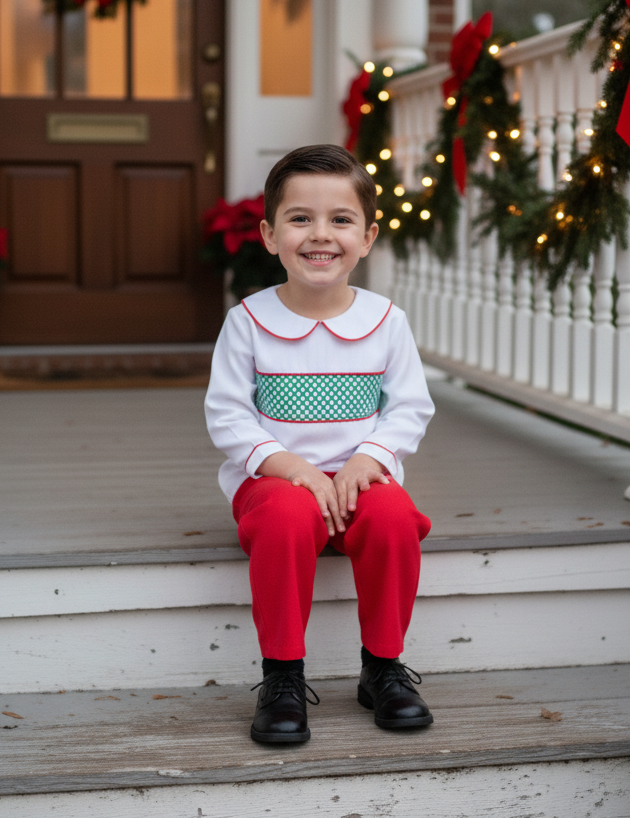 Child sitting on a porch decorated for Christmas with wreaths and lights.