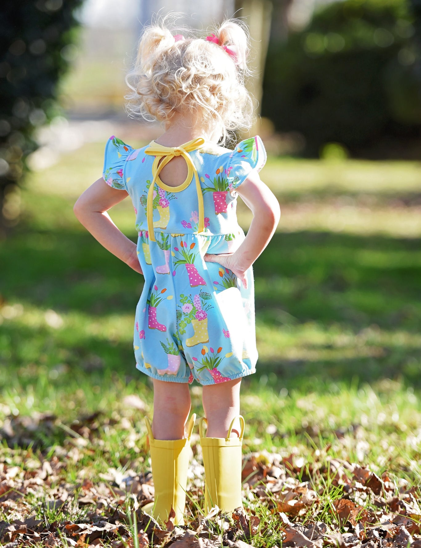 April Showers Rainboot Print Knit Romper